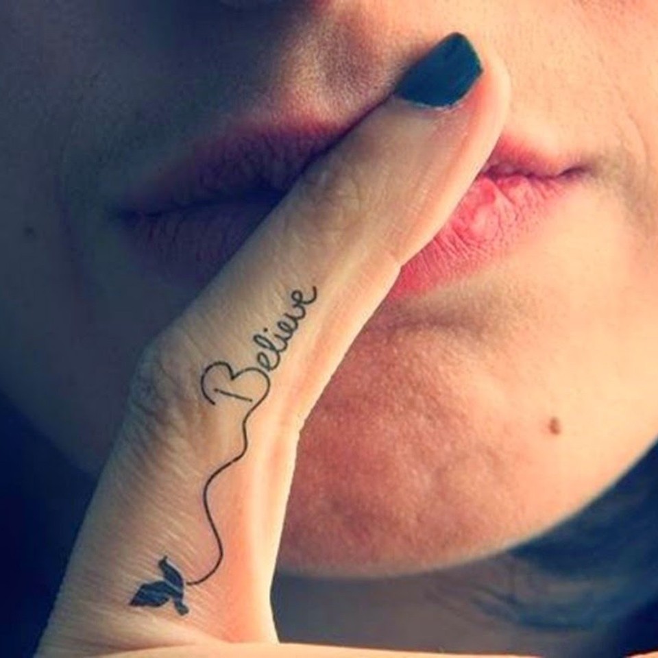 Believe Wording With Bird Tattoo On Finger For Girls