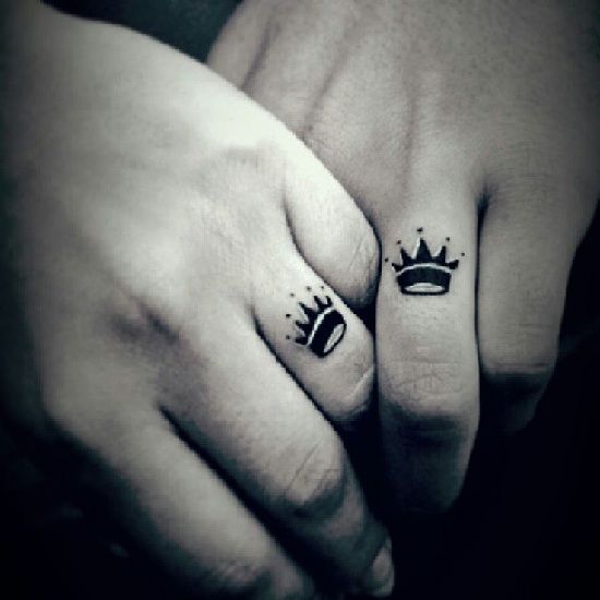 Black And Crown Tattoos On Fingers