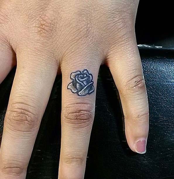 Black And Grey Rose Flower Tattoo On Finger