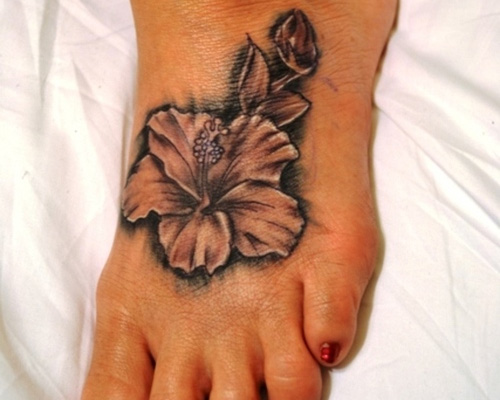 Black And White Hibiscus Flower Tattoo On Foot