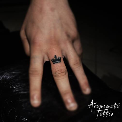 Black Crown Finger Tattoo