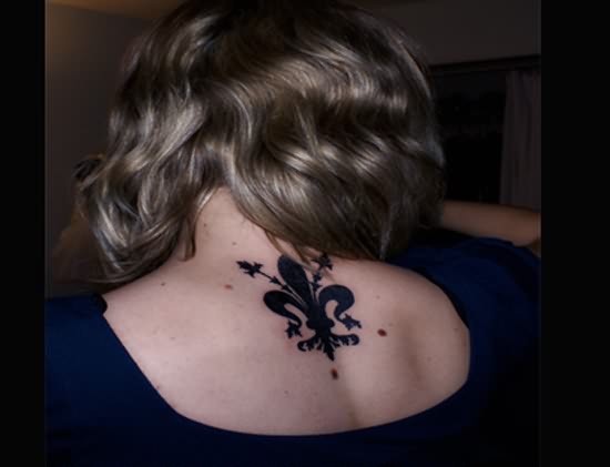 Black Fleur De Lis Tattoo On Woman Upper Back