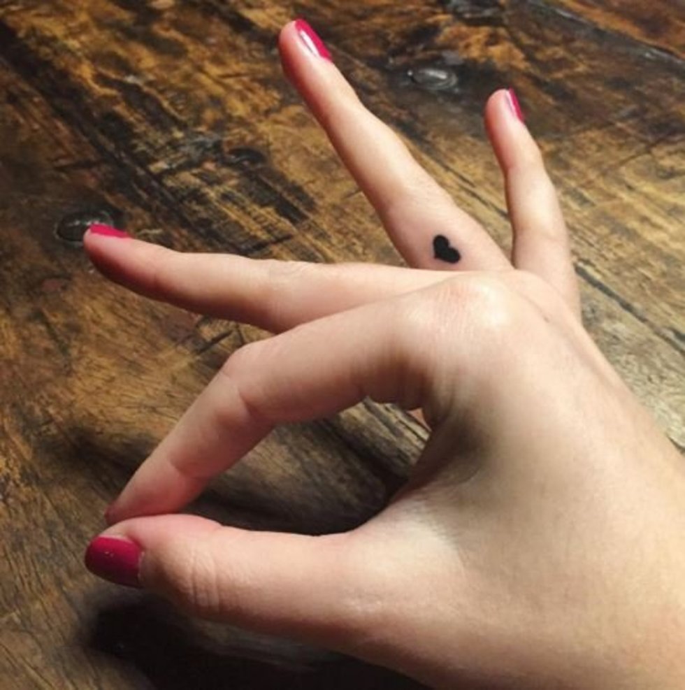 Black Heart Side Finger Tattoo For Girls