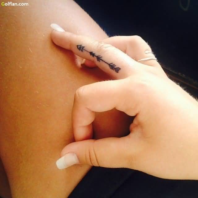 Black Ink Arrow Side Finger Tattoo