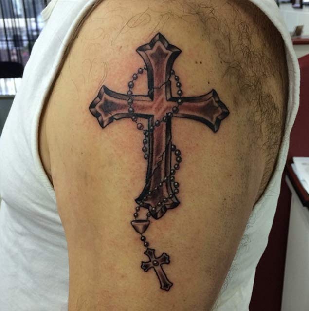 Black Ink Cross Christian Tattoo On Left Shoulder
