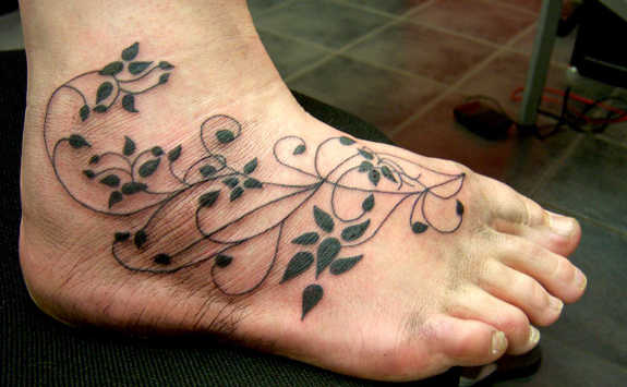 Black Plant Vine Tattoo On Foot