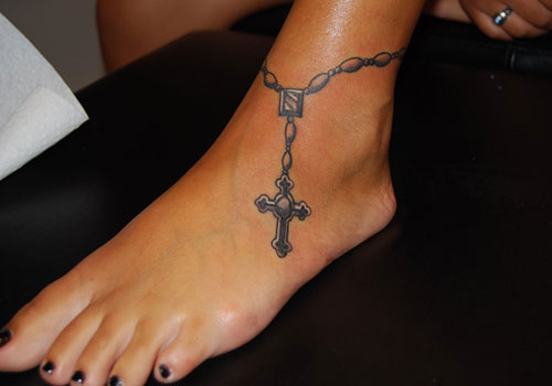 Black Rosary Bracelet Tattoo On Girl Foot