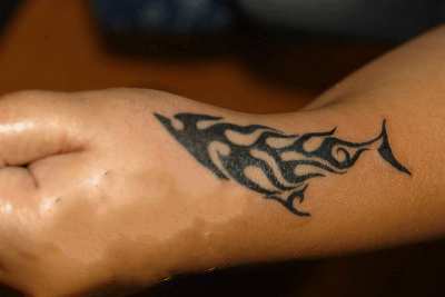 Black Tribal Tattoo On Left Hand