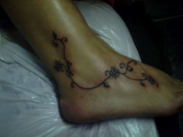 Black Vine On Foot Tattoo