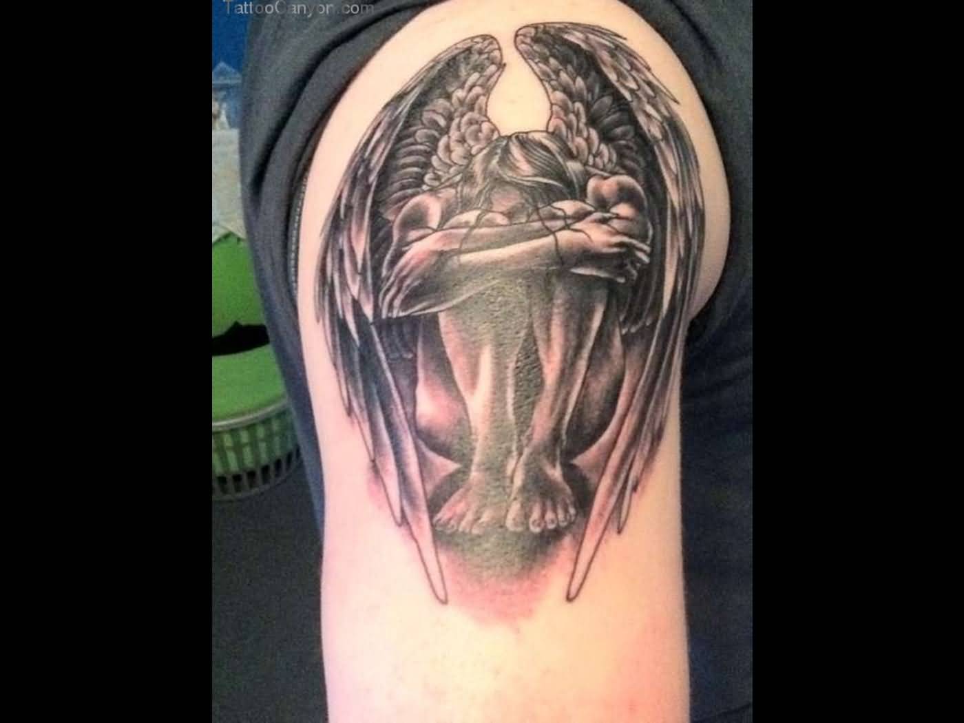 Black Weeping Angel Tattoo On Man Right Shoulder