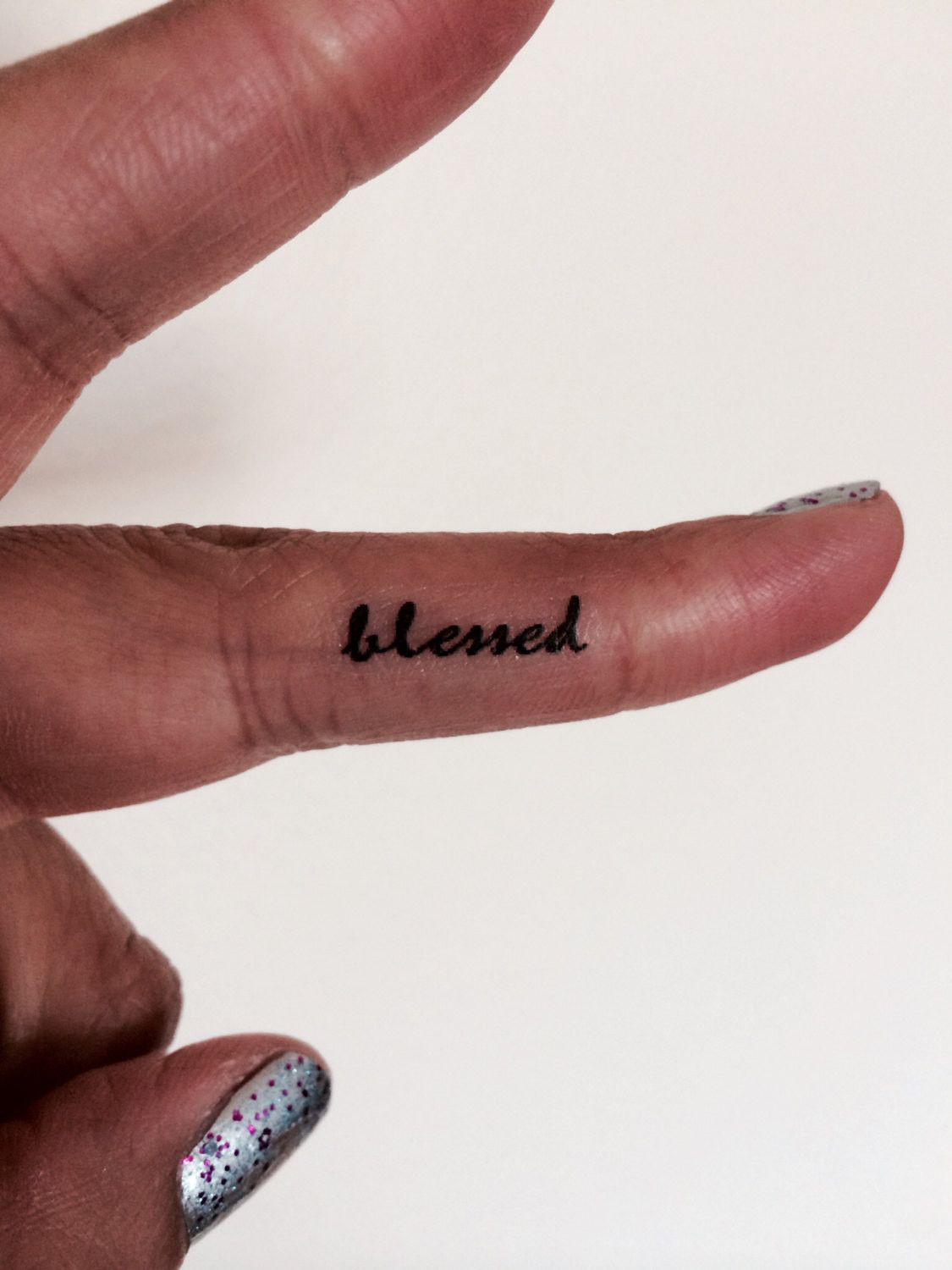 Blessed Girly Inner Finger Word Tattoo