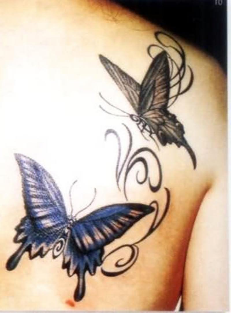 Blue And Grey Butterfly Tattoo On Back Shoulder