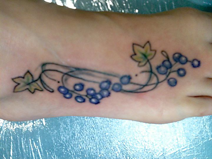Blue Berry And Vine Tattoo On Foot