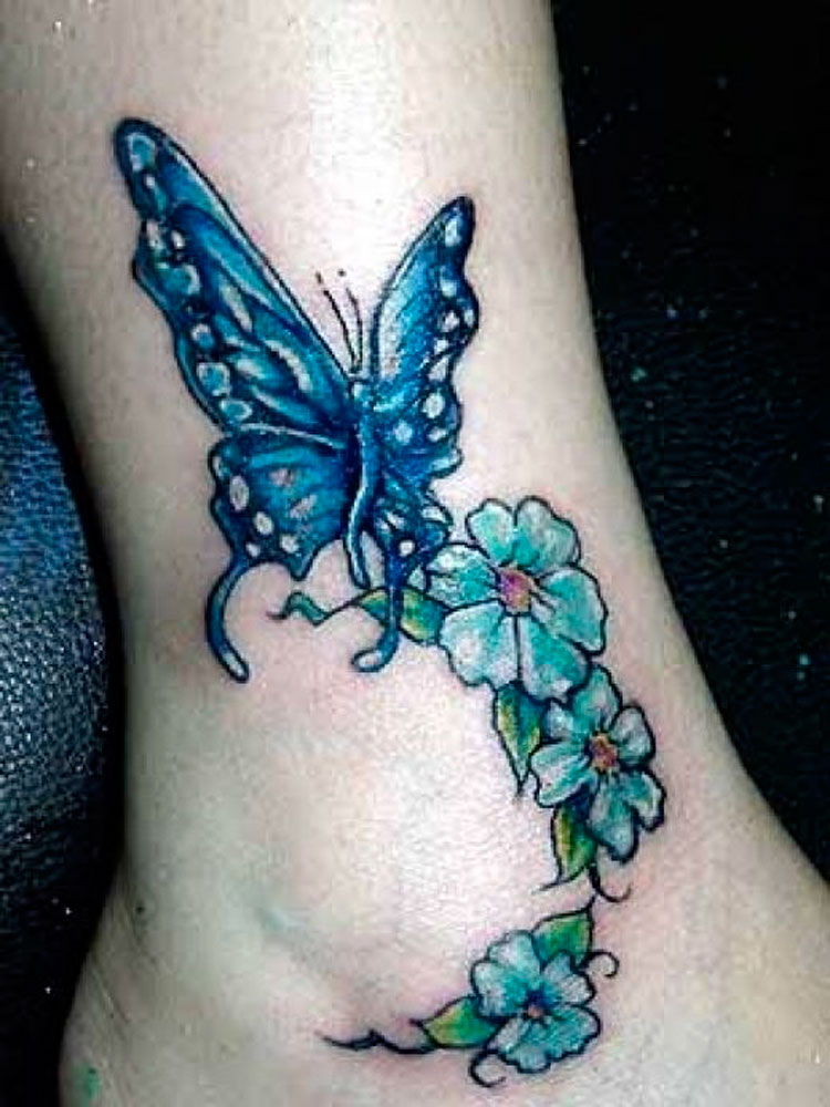 Blue Butterfly And Green Fklowers Tattoo On Ankle