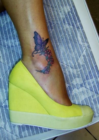 Blue Butterfly Floral Tattoo On Girl Ankle