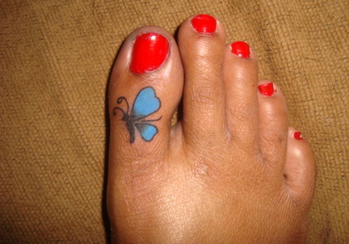Blue Butterfly Tattoo On Girl Toe