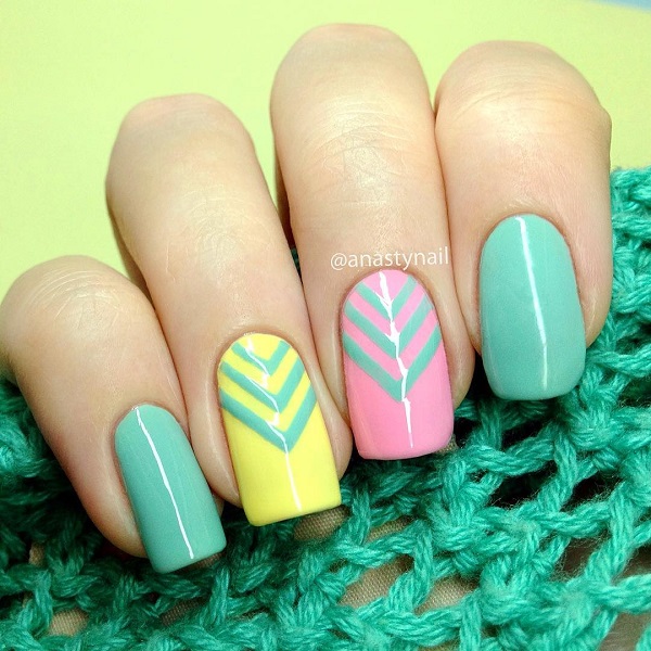Blue Chevron Design Over Pink And Yellow Nails Spring Nail Art