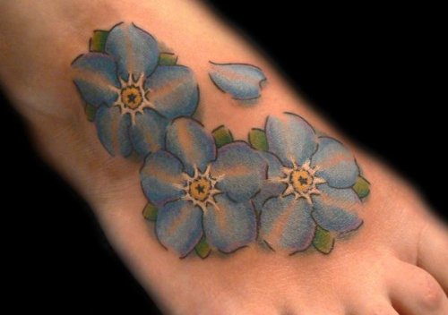 Blue Daisy Flowers Foot Tattoo