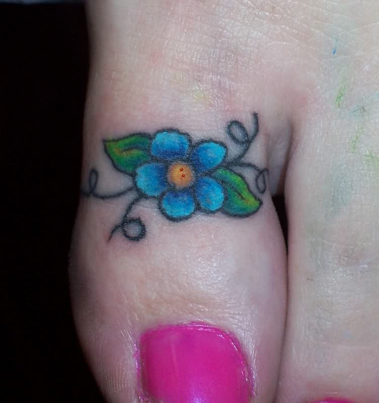 Blue Flower Tattoo On Toe For Girls