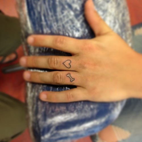 Bone And Heart Finger Tattoo