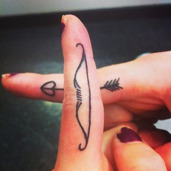 Bow And Arrow Finger Tattoos For Girls