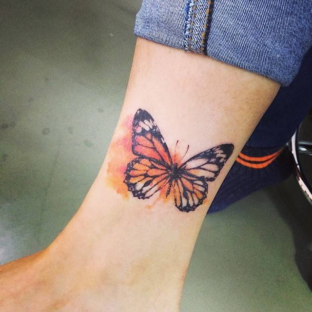 Brilliant Watercolor Style Butterfly Tattoo On Ankle By Doy