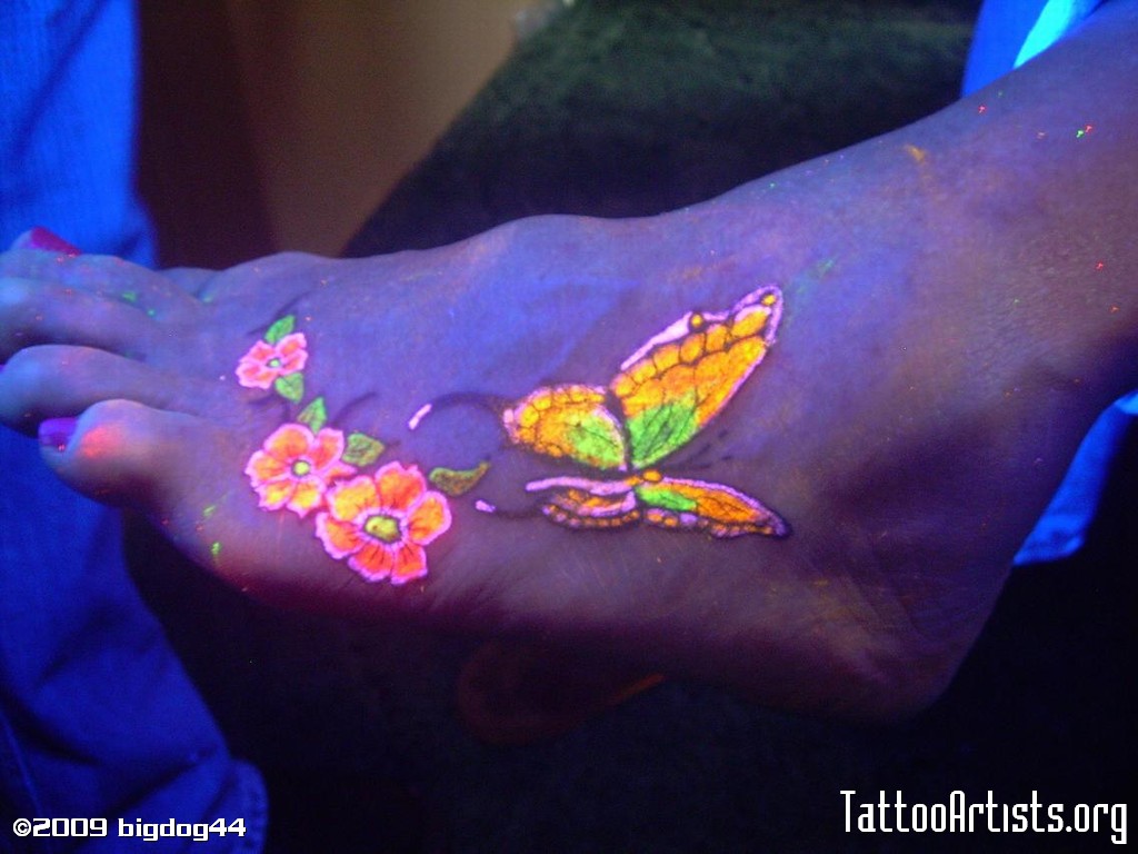 Butterfly And Flowers UV Tattoo On Foot For Girls