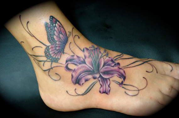 Butterfly And Lily Flower Tattoo On Foot