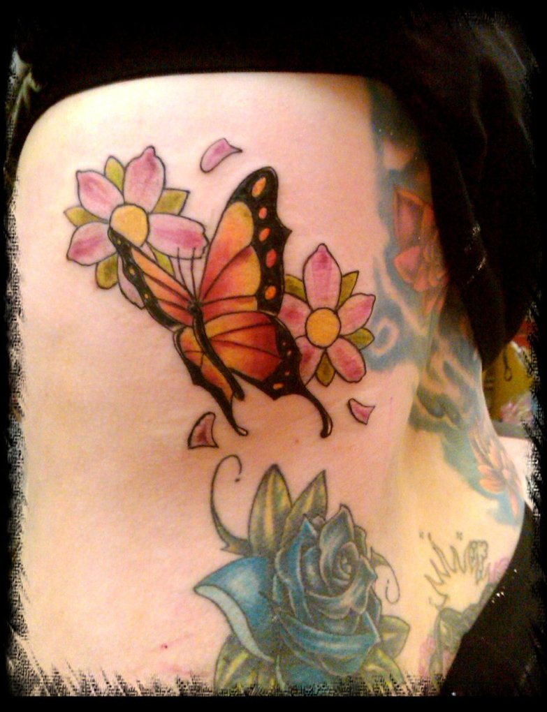 Butterfly With Flowers Tattoo On Side Rib