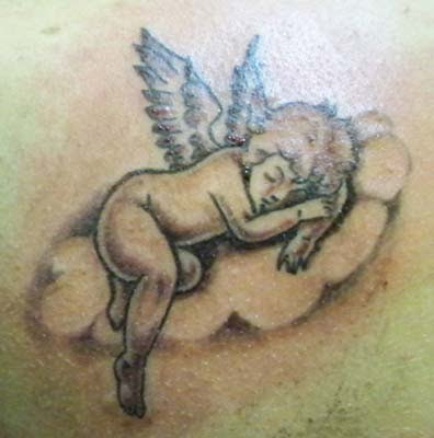 Cherub Angel Sleeping On Clouds Tattoo