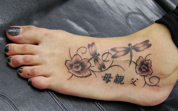 Chinese Flowers And Dragonflies Tattoo On Foot For Girls