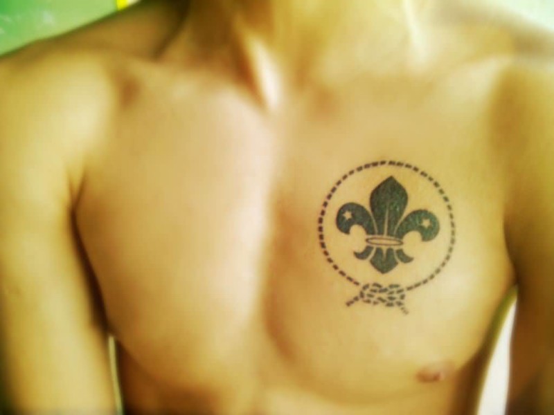 Circular Fleur De Lis Tattoo On Chest For Men