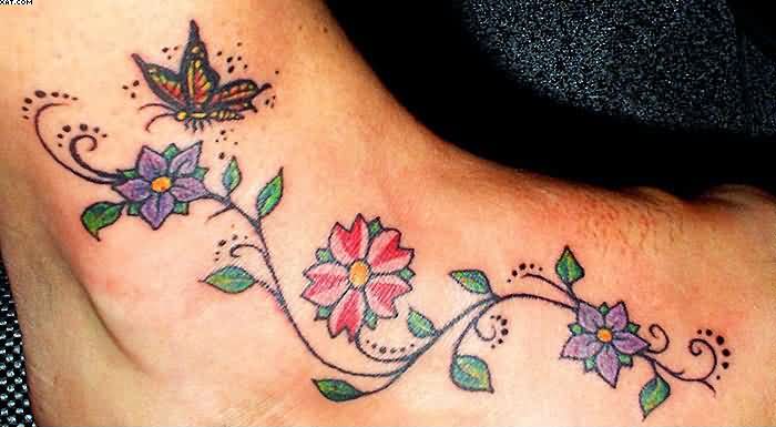 Color Flowers And Butterfly Vine Tattoo On Foot