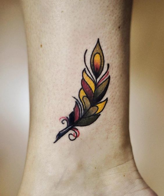 Colored Feather Tattoo On Side Leg