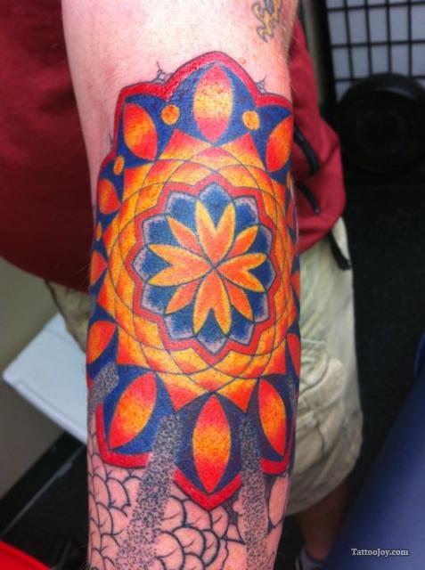 Colored Mandala Flower Tattoo On Arm