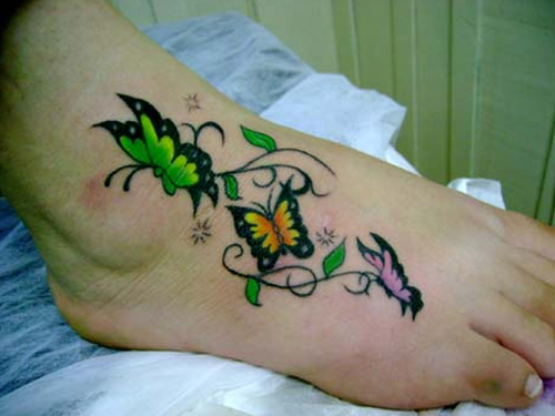 Colorful Butterflies Stars Tattoo On Foot