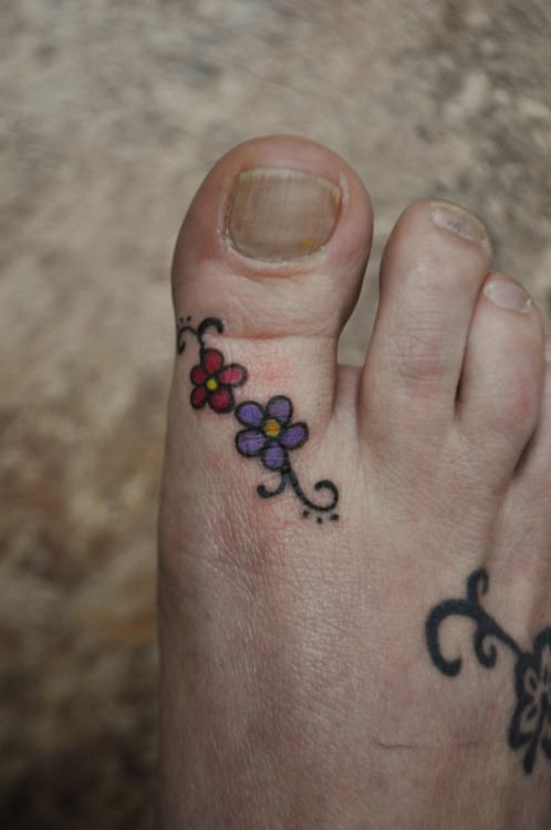 Colorful Floral Big Toe Tattoo For Boy