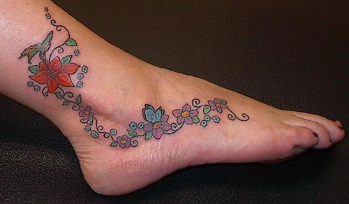 Colorful Flowers Vine Tattoo On Foot And Ankle