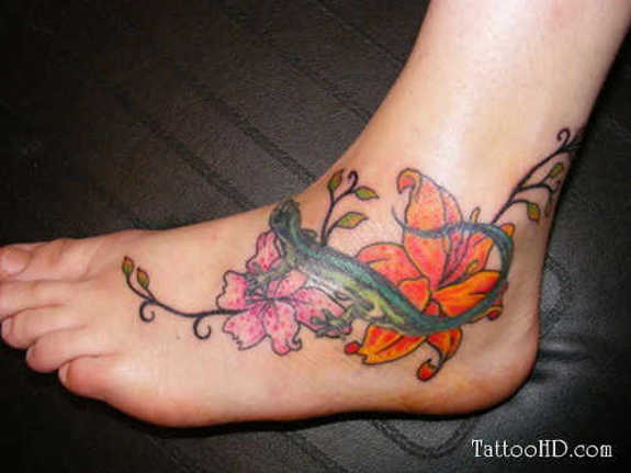 Colorful Flowers With Lizard Tattoo On Foot