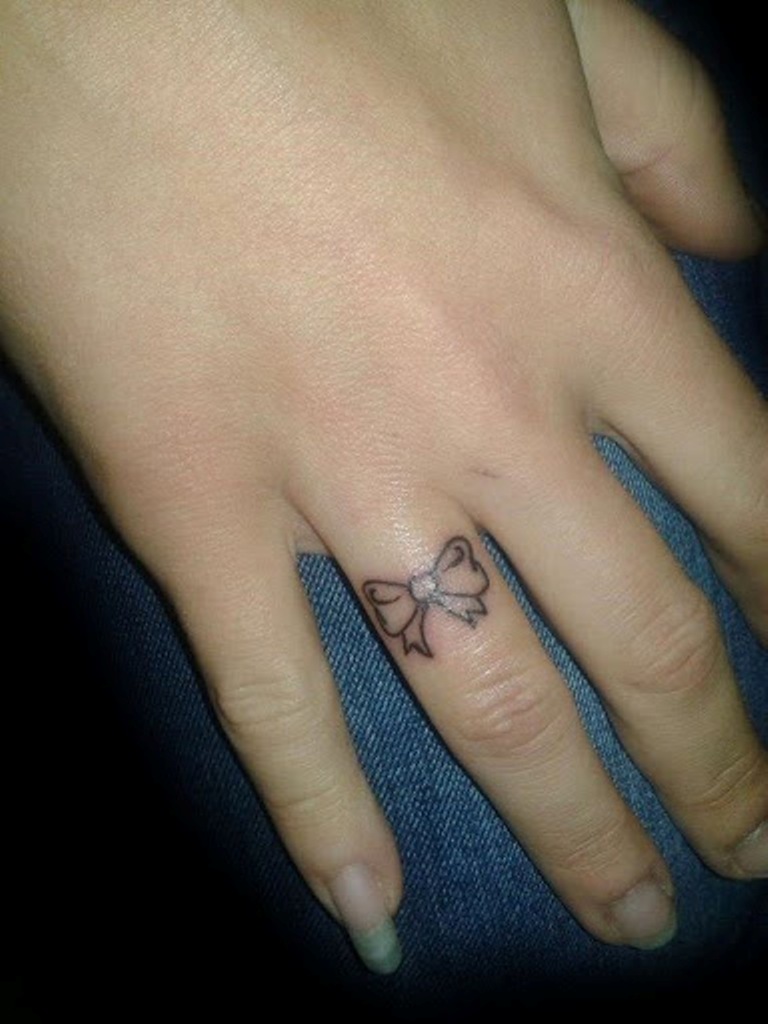 Colorless Finger Bow Tattoo For Girls