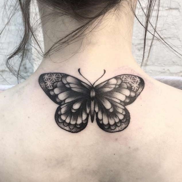 Cool Black Butterfly Tattoo On Girl Upper Back By Electric Lady