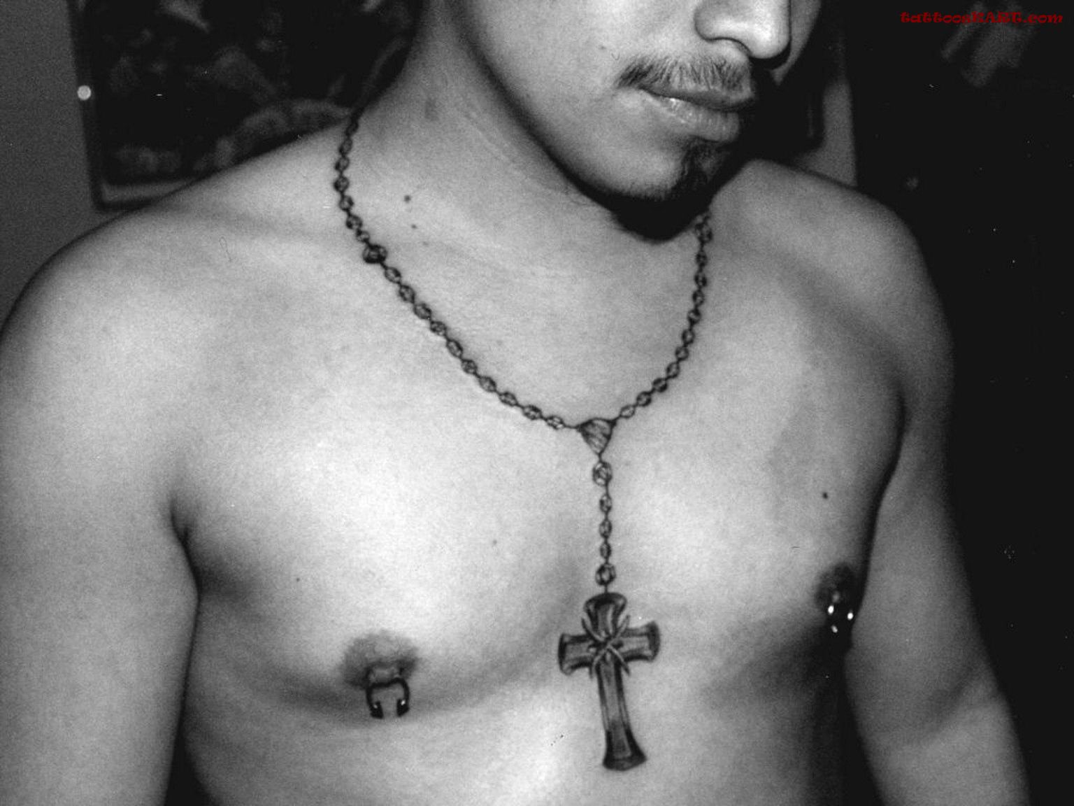 Cool Rosary Tattoo On Chest For Men