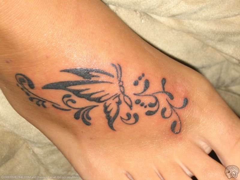 Cool Tribal Butterfly Tattoo On Foot