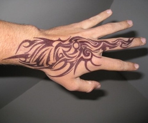 Cool Tribal Hand Tattoo By Madeleine