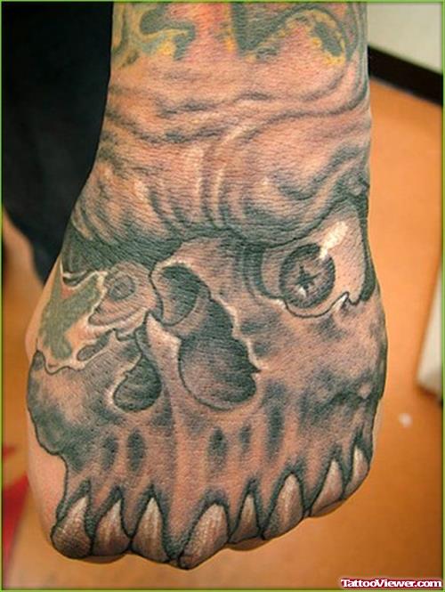 Creative Grey Skull Hand Tattoo