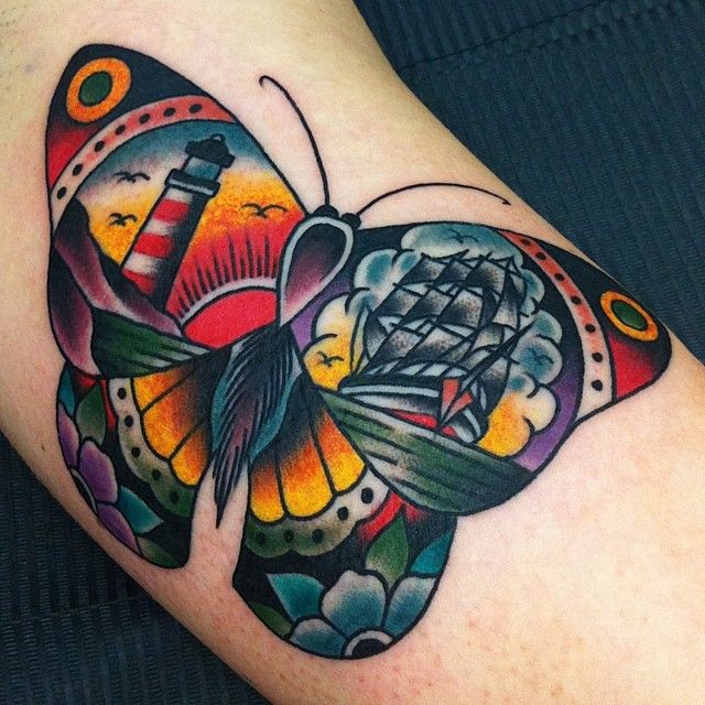 Creative Traditional Butterfly Tattoo On Arm