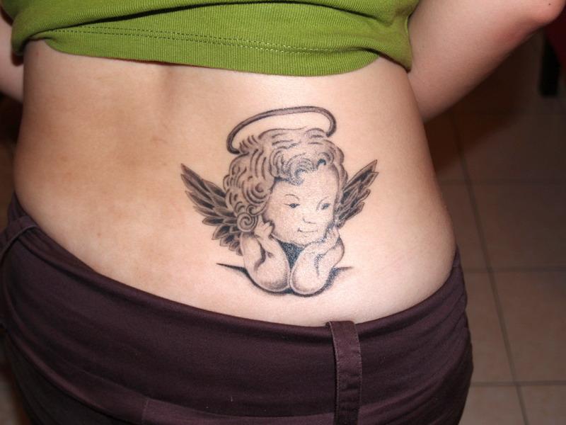 Cute Baby Angel Tattoo On Lower Back