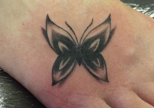 Cute Black Butterfly Tattoo On Foot