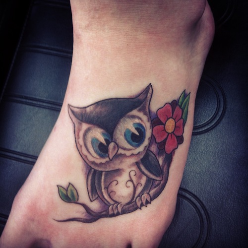 Cute Blue Eye Owl With Flower Tattoo On Foot