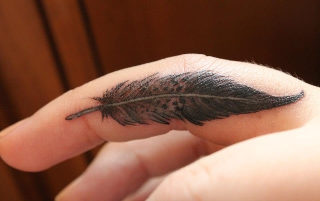 Cute Feather Tattoo On Finger